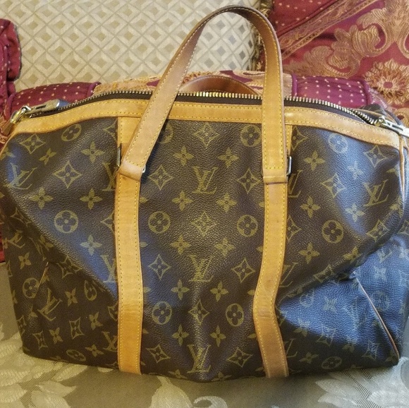 Louis Vuitton Handbags - SOLD.    LV Keepall Sac Souple 35 Travel Bag